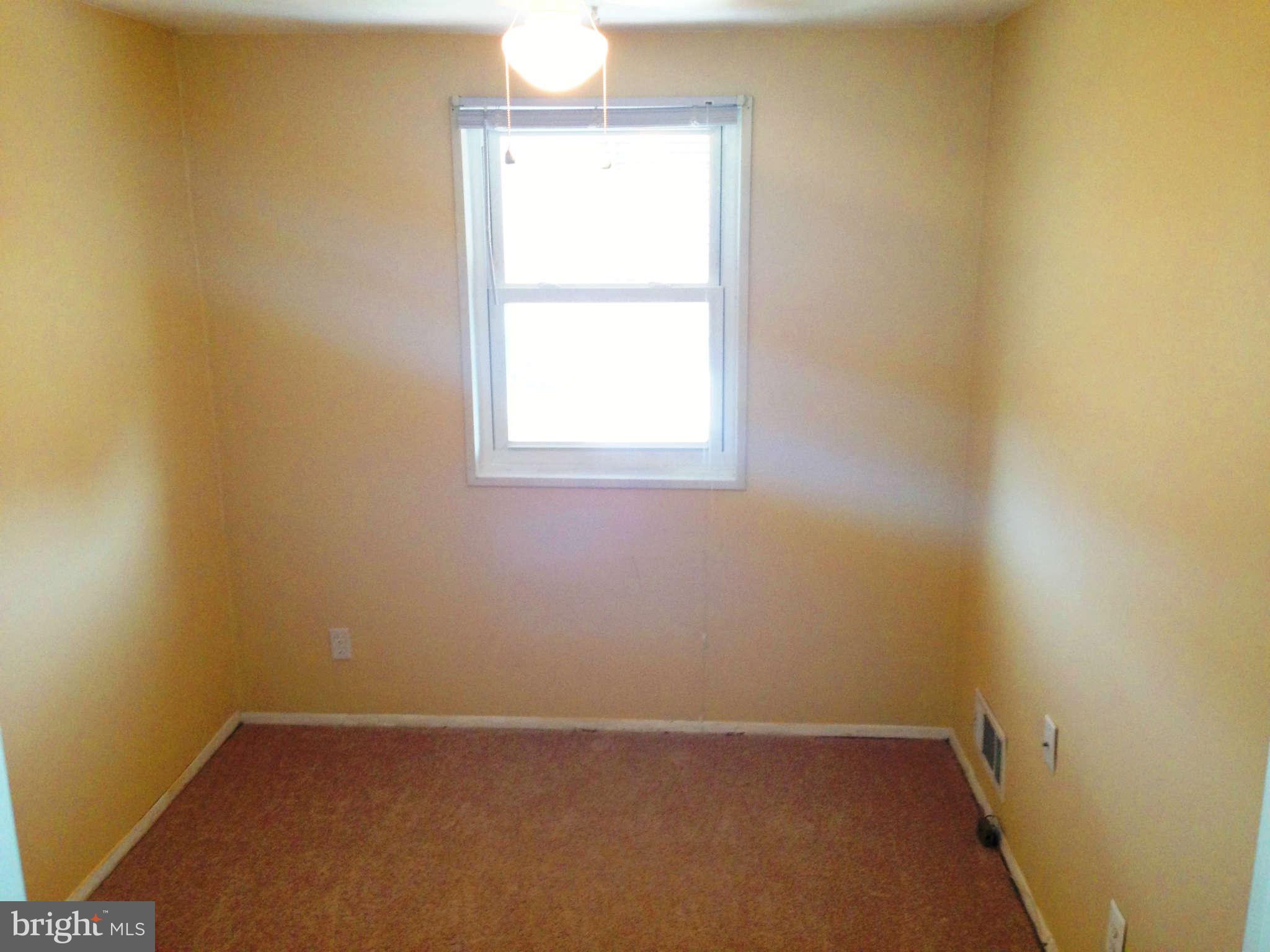1011 Bayner Road Baltimore, MD 21221 - Photo 16 of 30 an empty room with a window