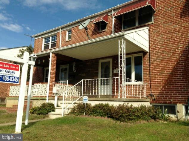 1011 Bayner Road Baltimore, MD 21221 - Photo 29 of 30 a front view of a house with a yard