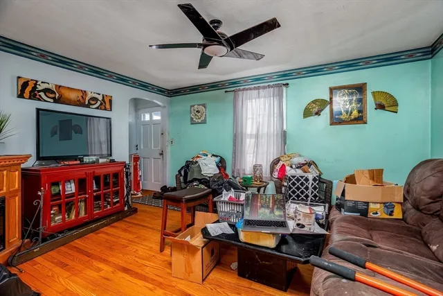 a living room with furniture and a flat screen tv