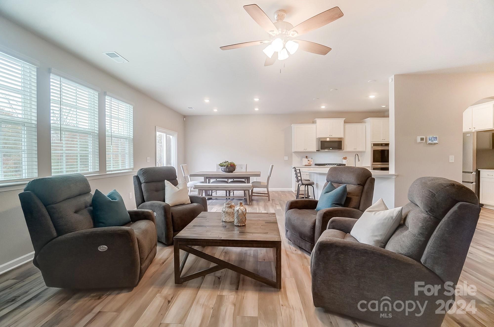 5585 Soft Shell Drive Lancaster, SC 29720 - Photo 15 of 41 a living room with furniture and a large window