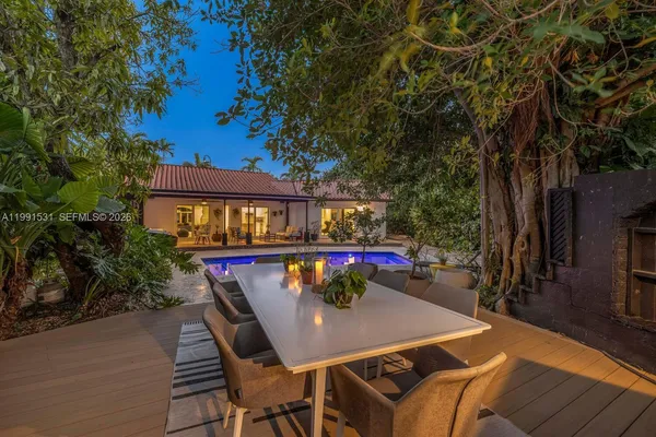 an outdoor space with furniture