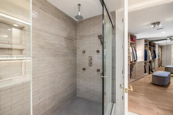 a bathroom with a sink a toilet and bathtub