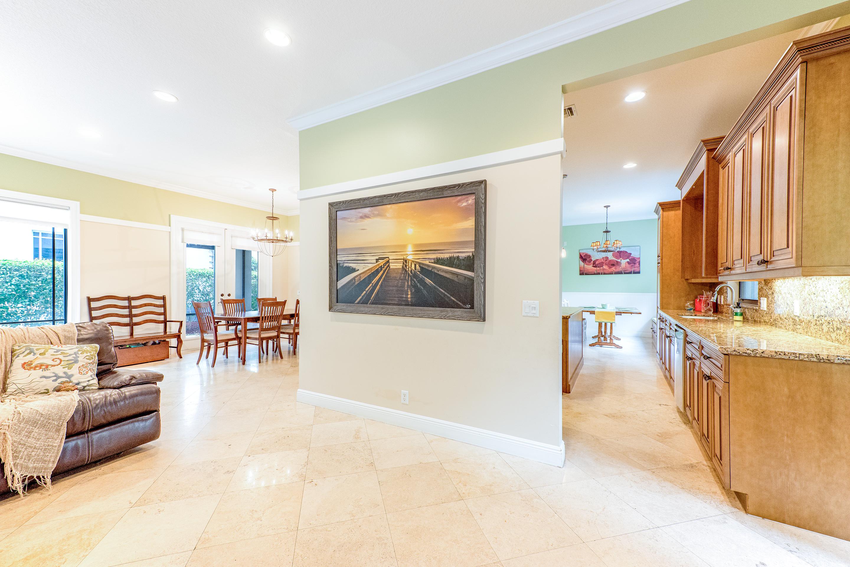 568 Northwest Browning Way Boca Raton, FL 33432 - Photo 9 of 51 Living Room to Kitchen