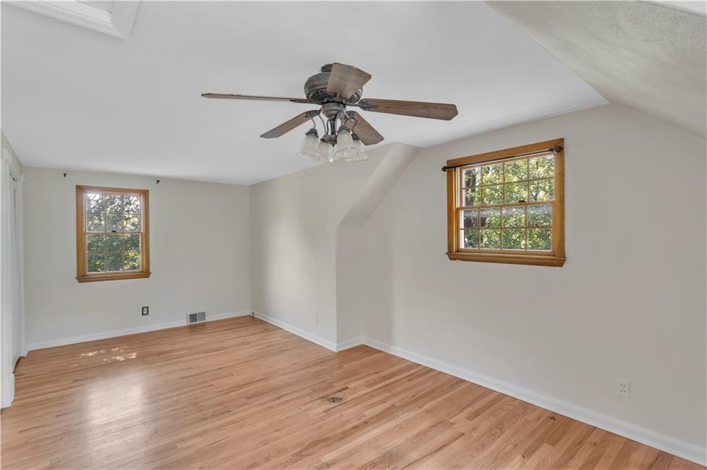 2753 Rochester Road Cranberry Township, PA 16066 - Photo 19 of 38 a view of empty room with wooden floor