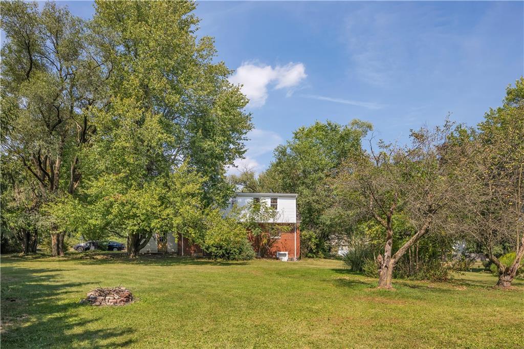 2753 Rochester Road Cranberry Township, PA 16066 - Photo 32 of 38 a view of a large trees with houses in background