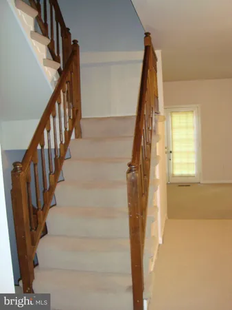 a view of an entryway with staircase