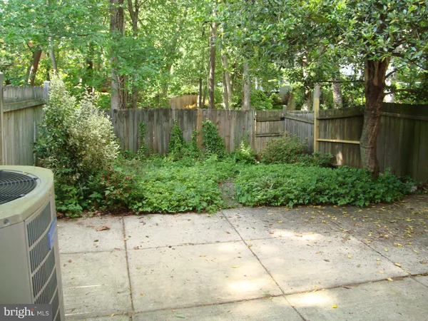 a view of backyard with green space