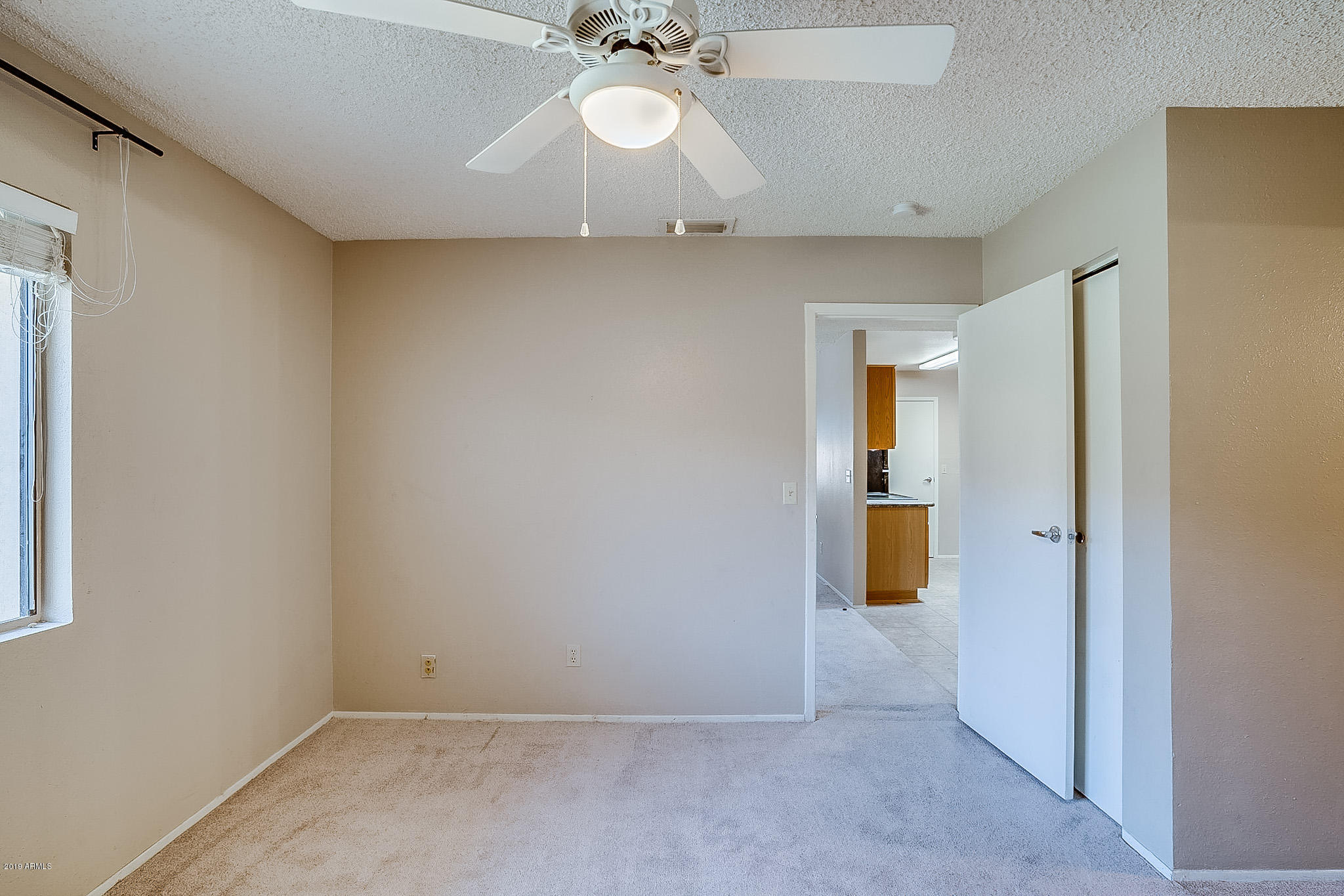 3511 East Baseline Road, Unit 1122 Phoenix, AZ 85042 - Photo 17 of 21 an empty room with a bathroom