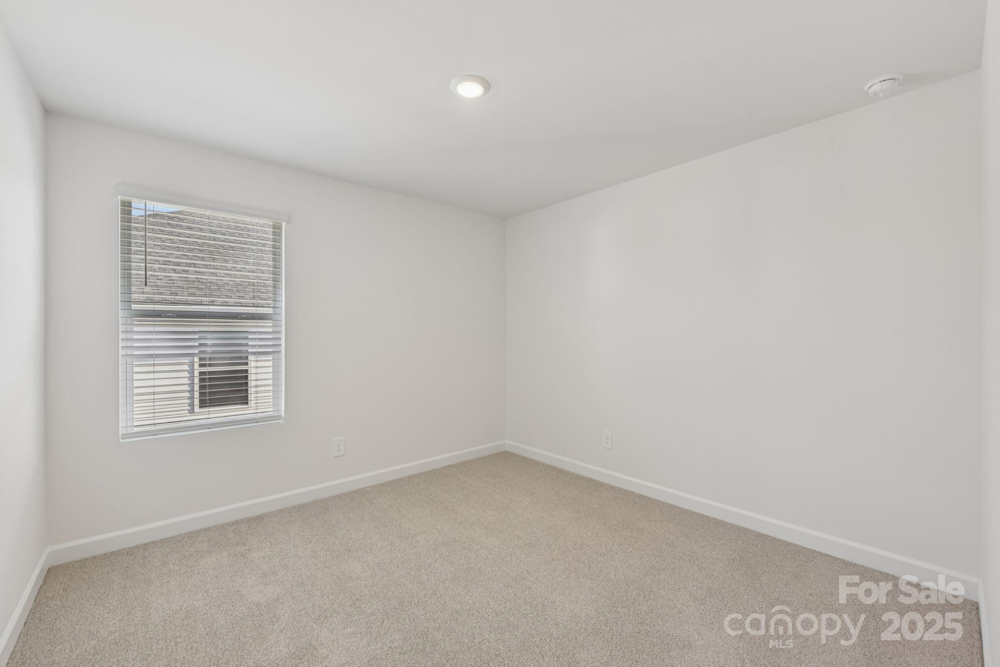 167 Murphy Mdw Road Mocksville, NC 27028 - Photo 14 of 28 an empty room with a window