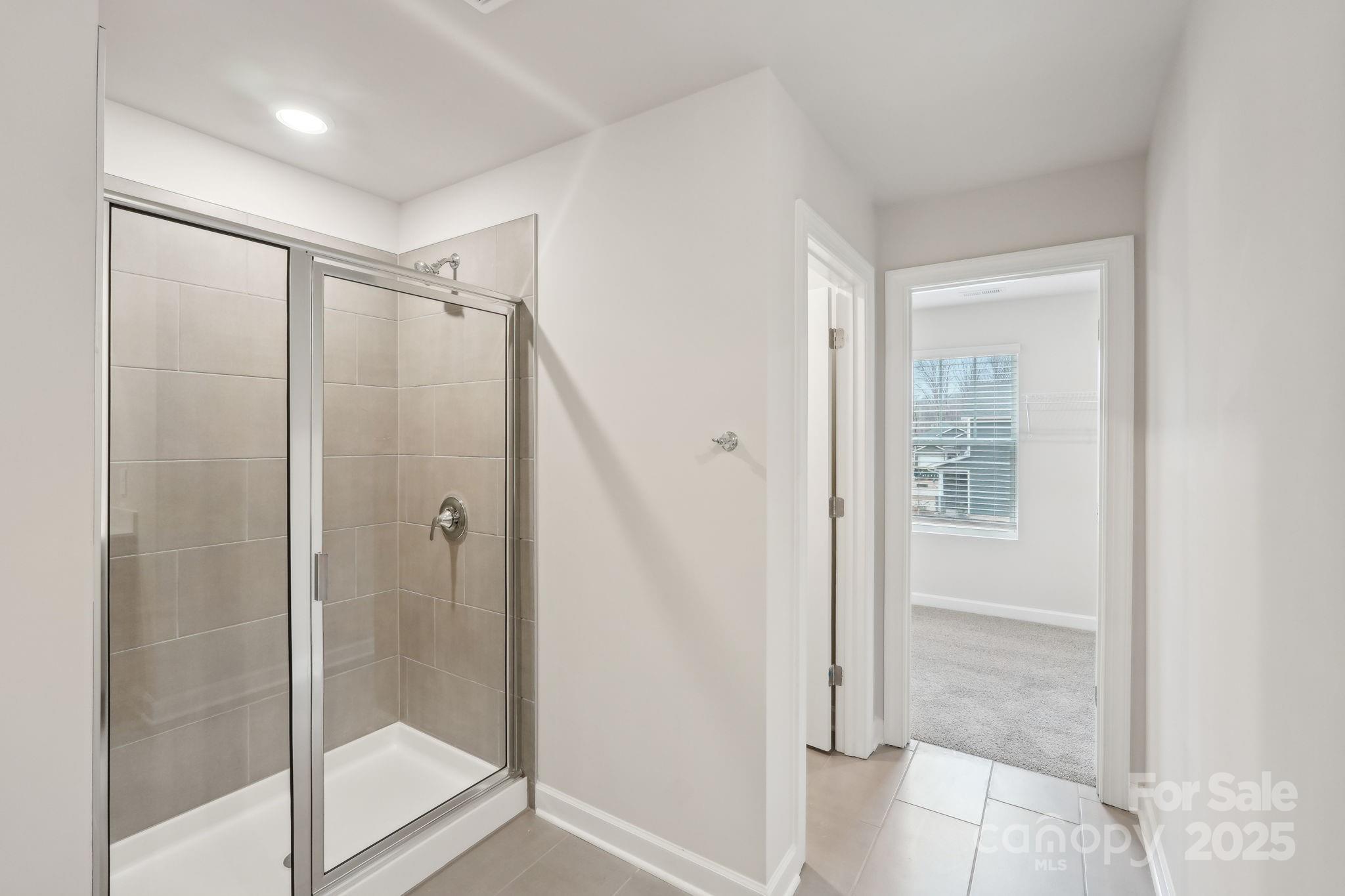 167 Murphy Mdw Road Mocksville, NC 27028 - Photo 16 of 21 a bathroom with a glass shower door