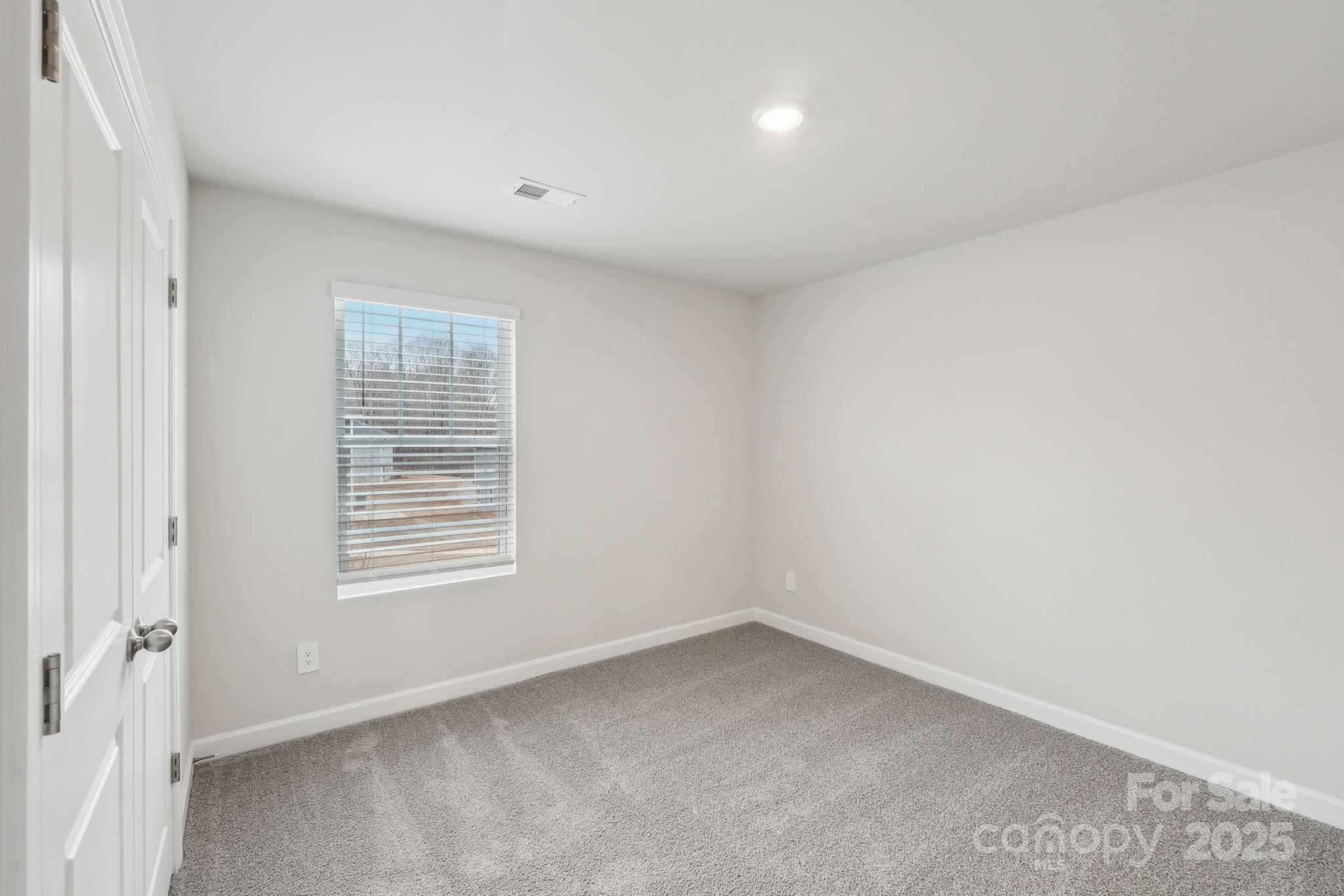 167 Murphy Mdw Road Mocksville, NC 27028 - Photo 17 of 21 an empty room with a window