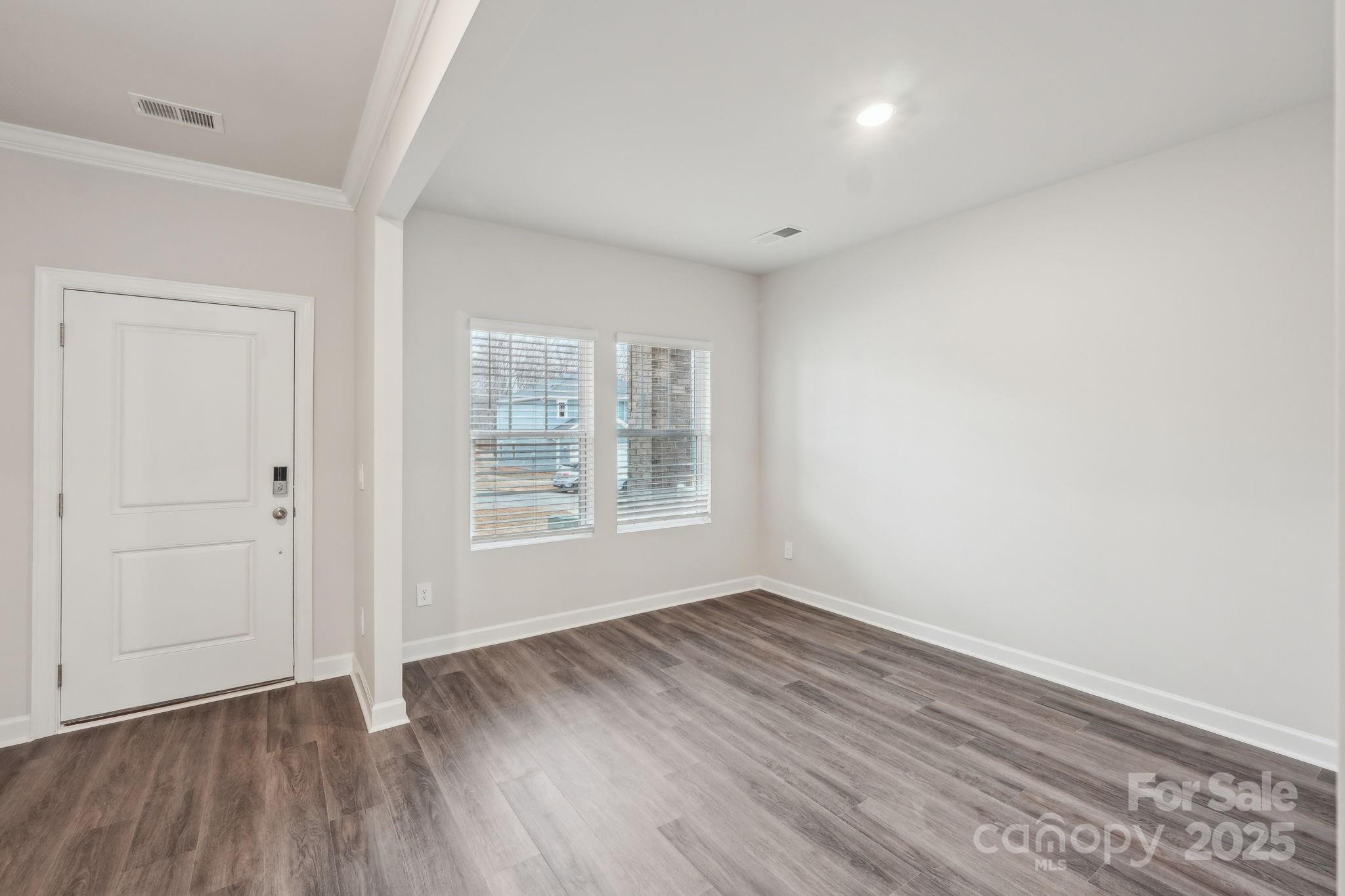 167 Murphy Mdw Road Mocksville, NC 27028 - Photo 2 of 21 wooden floor in an empty room with a window