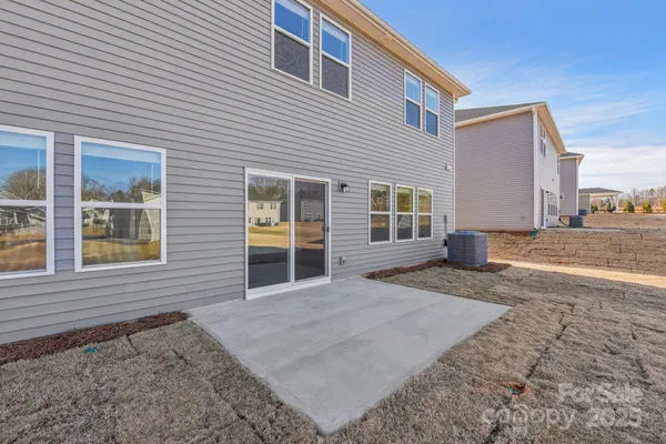 a view of backyard of a house