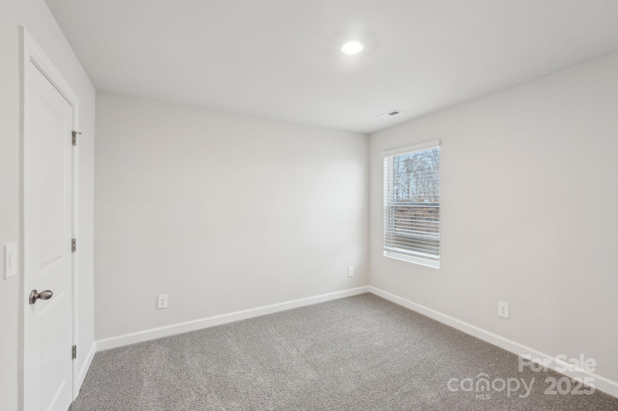 167 Murphy Mdw Road Mocksville, NC 27028 - Photo 10 of 21 a view of an empty room with a window