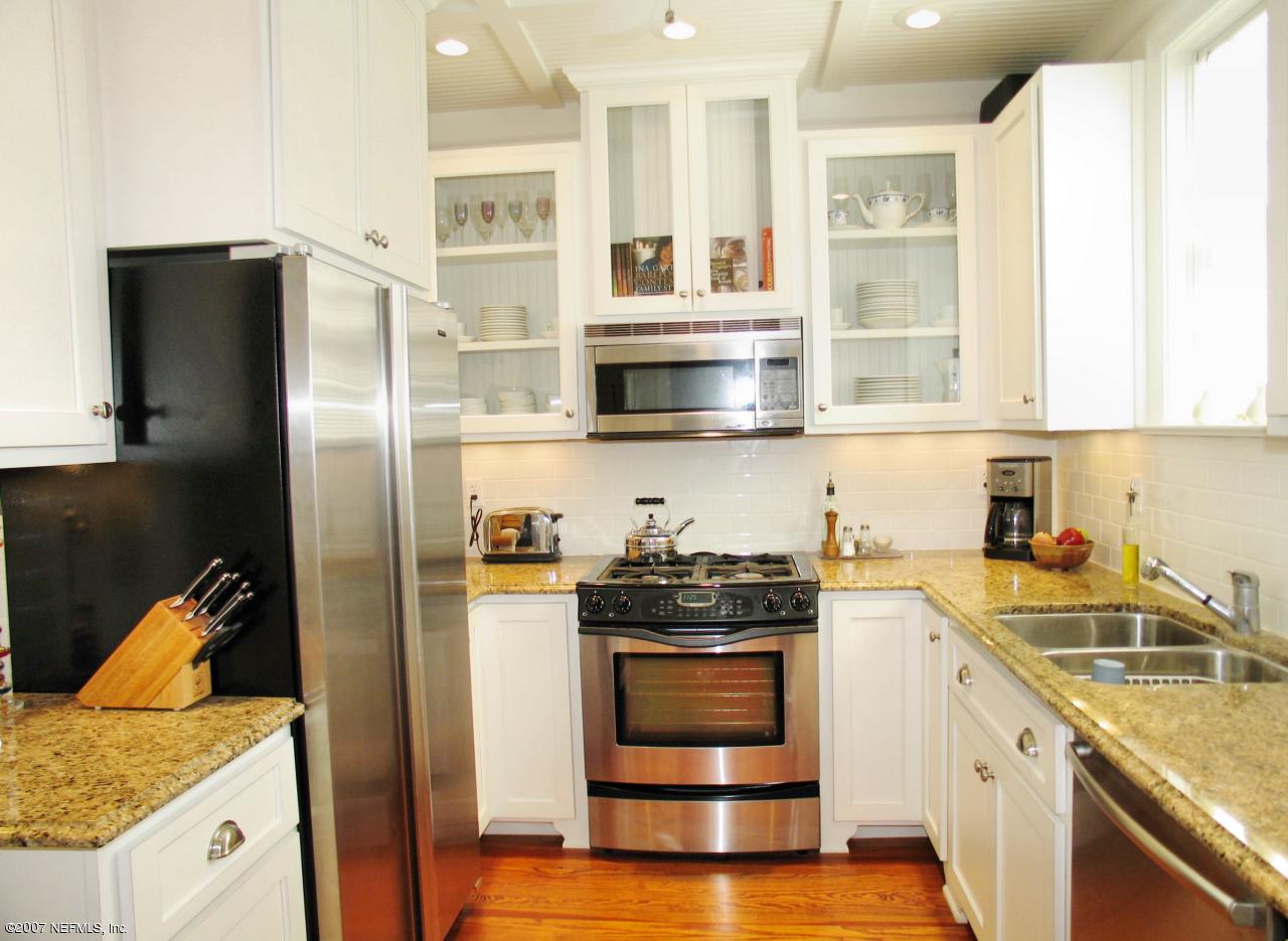 1604 Berwick Road Jacksonville, FL 32207 - Photo 5 of 13 a kitchen with a sink stove and refrigerator