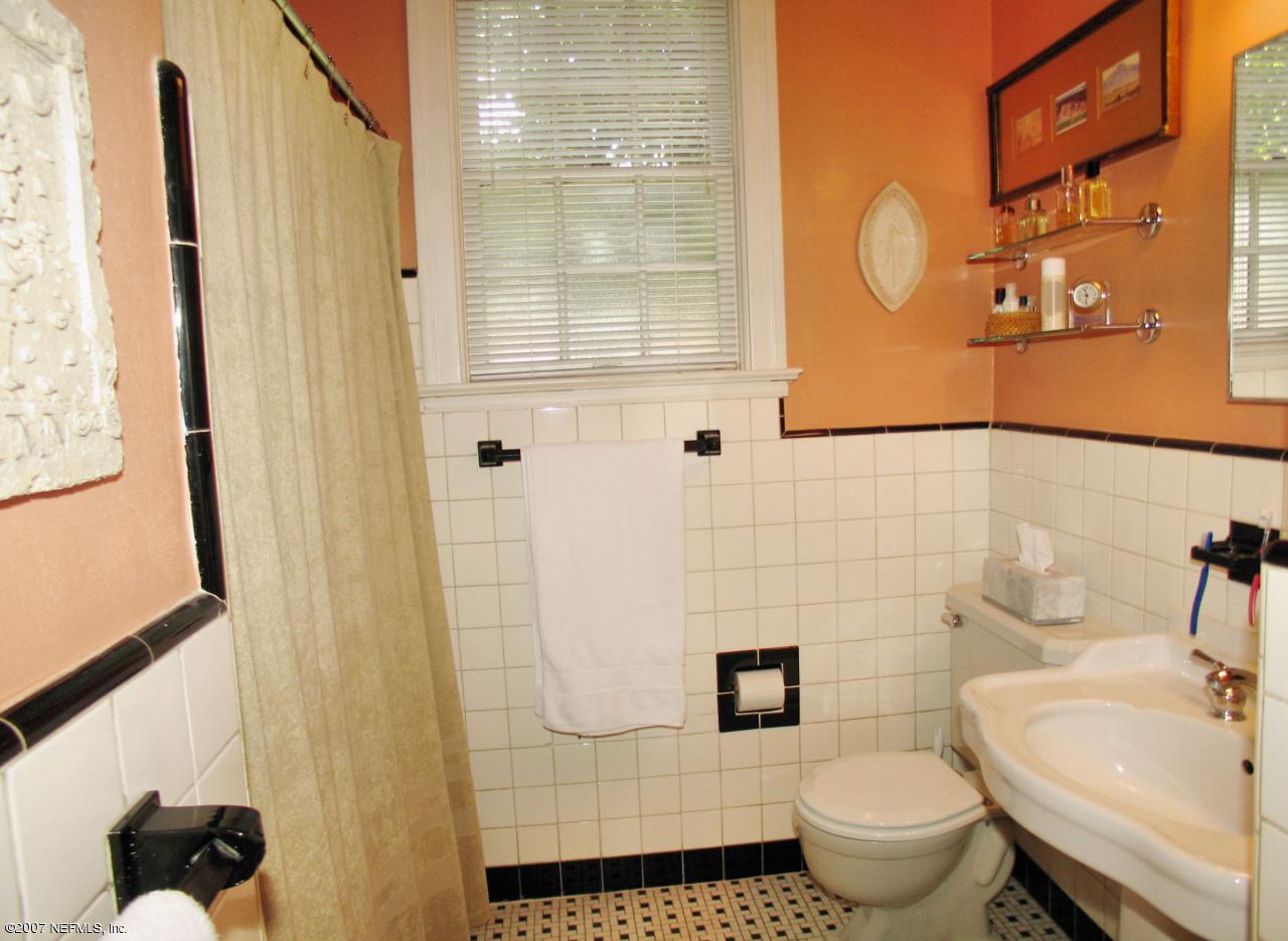 1604 Berwick Road Jacksonville, FL 32207 - Photo 7 of 13 a bathroom with a toilet and a shower