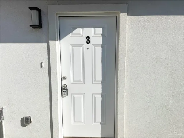 a picture of a bathroom with a shower
