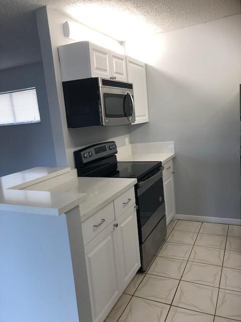 14 Crossings Circle, Unit G Boynton Beach, FL 33435 - Photo 3 of 13 Kitchen1