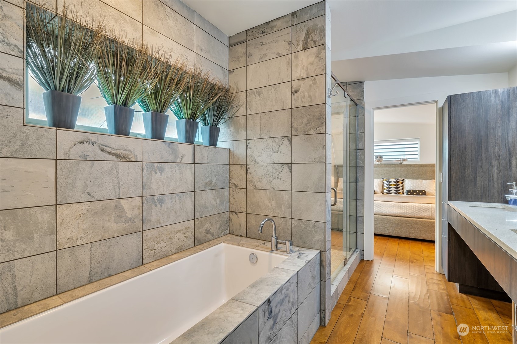4457 Renton Avenue South Seattle, WA 98108 - Photo 14 of 40 a bathroom with a tub a sink and a shower