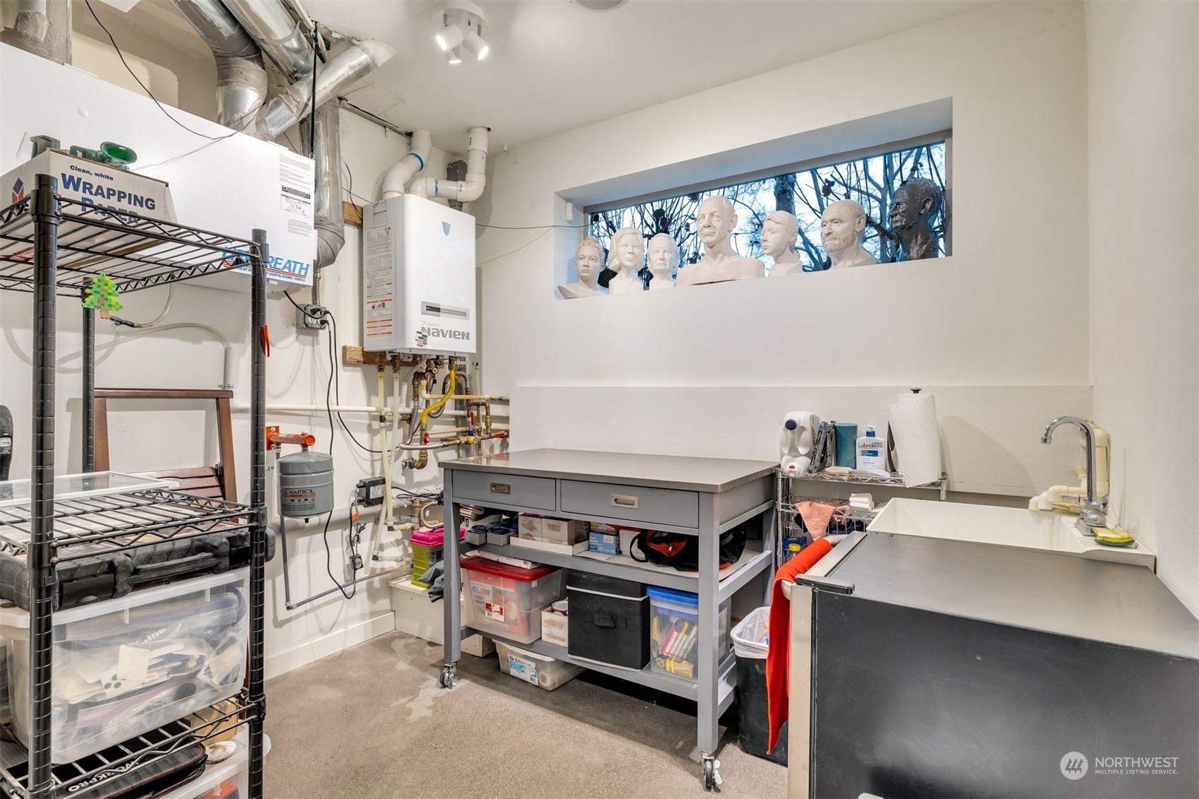4457 Renton Avenue South Seattle, WA 98108 - Photo 23 of 40 a storage room with cabinets