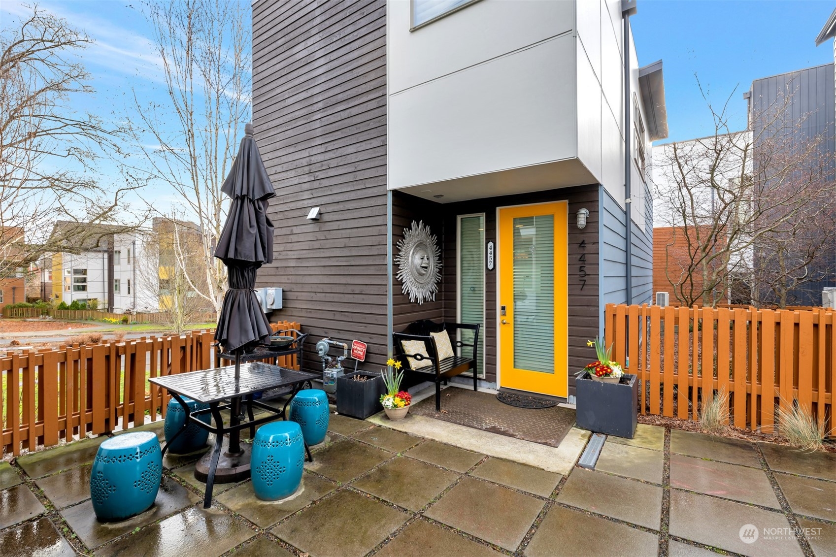 4457 Renton Avenue South Seattle, WA 98108 - Photo 27 of 40 a view of a patio with table and chairs and potted plants