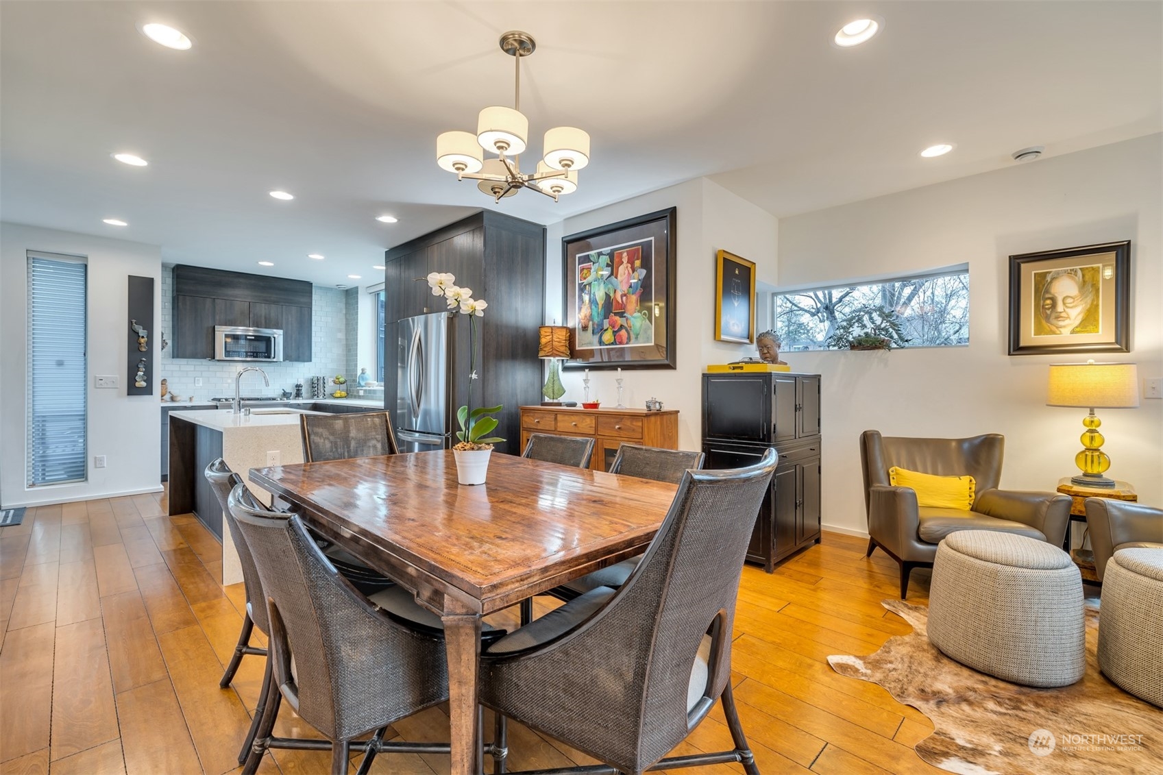 4457 Renton Avenue South Seattle, WA 98108 - Photo 4 of 40 a view of a dining room with furniture and wooden floor
