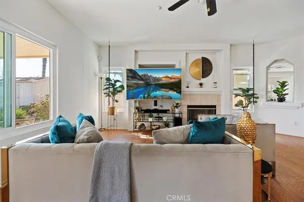 a living room with furniture and a window
