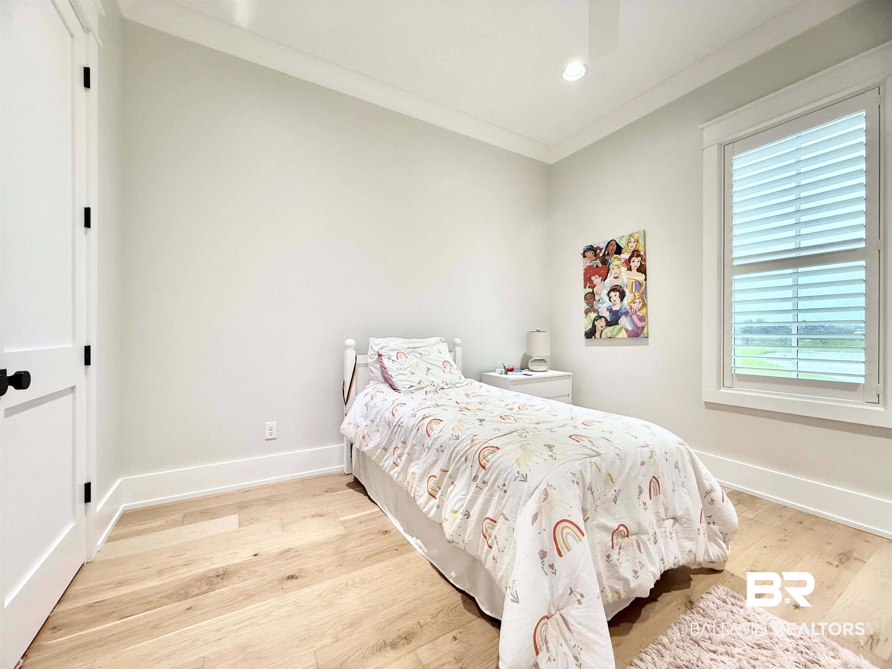 21767 Gallery Boulevard Fairhope, AL 36532 - Photo 22 of 74 Bedroom featuring light wood-type flooring, ornamental molding, and recessed lighting