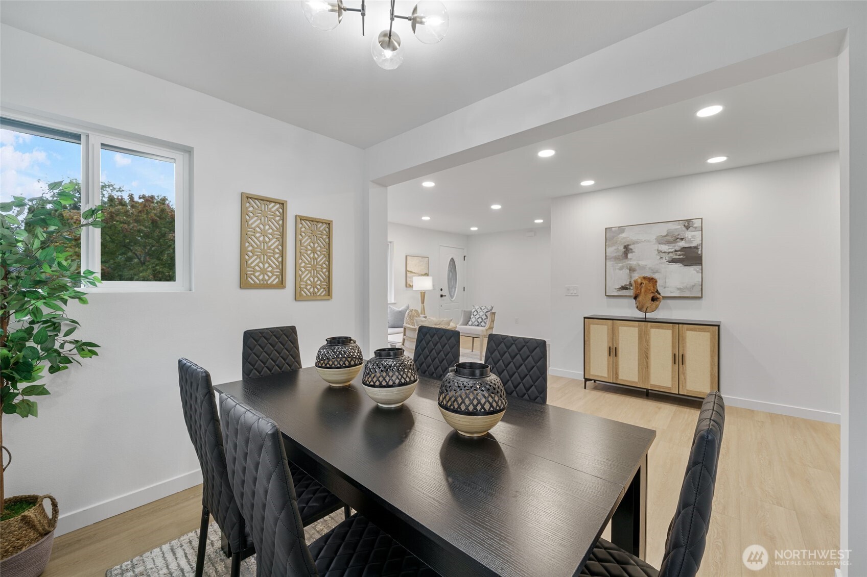 7004 16th Avenue Southwest Seattle, WA 98106 - Photo 11 of 37 a view of a dining room with furniture and wooden floor