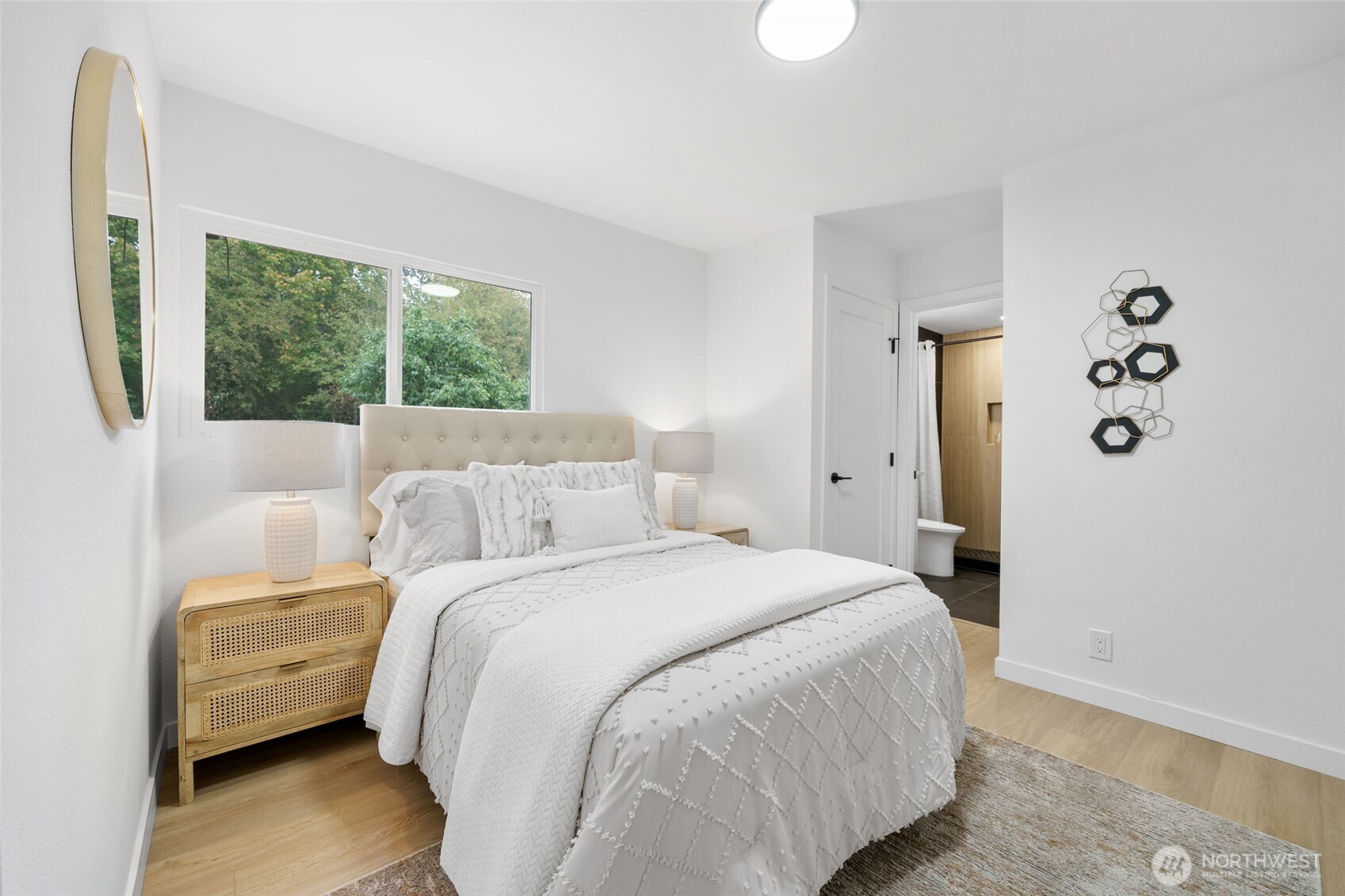 7004 16th Avenue Southwest Seattle, WA 98106 - Photo 18 of 37 a bedroom with a bed and a window