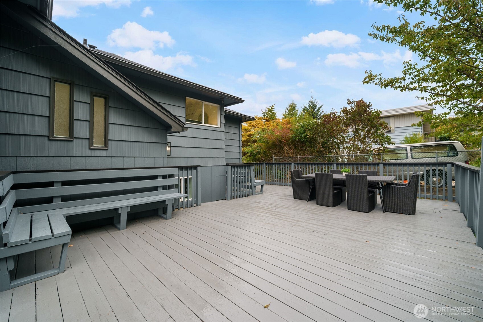 7004 16th Avenue Southwest Seattle, WA 98106 - Photo 29 of 37 a view of a roof deck with couches and sky view