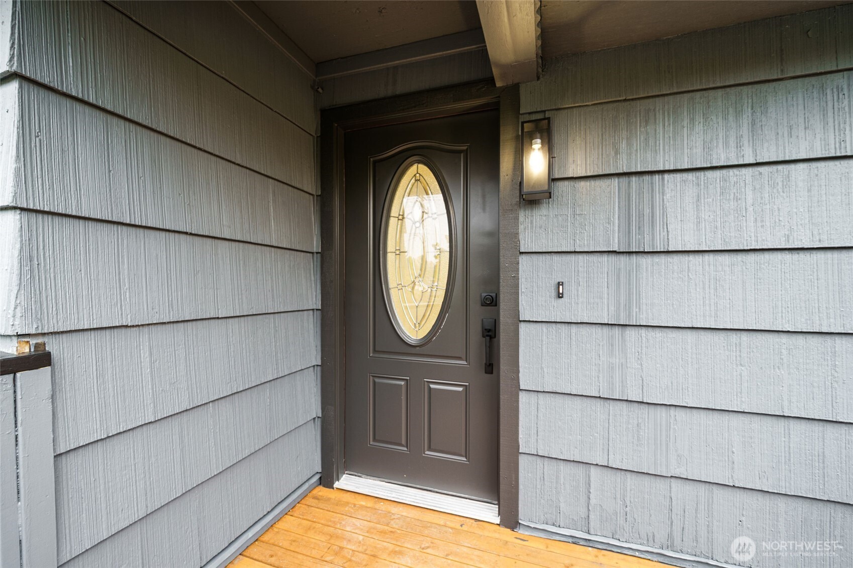 7004 16th Avenue Southwest Seattle, WA 98106 - Photo 3 of 37 a view of a wooden door