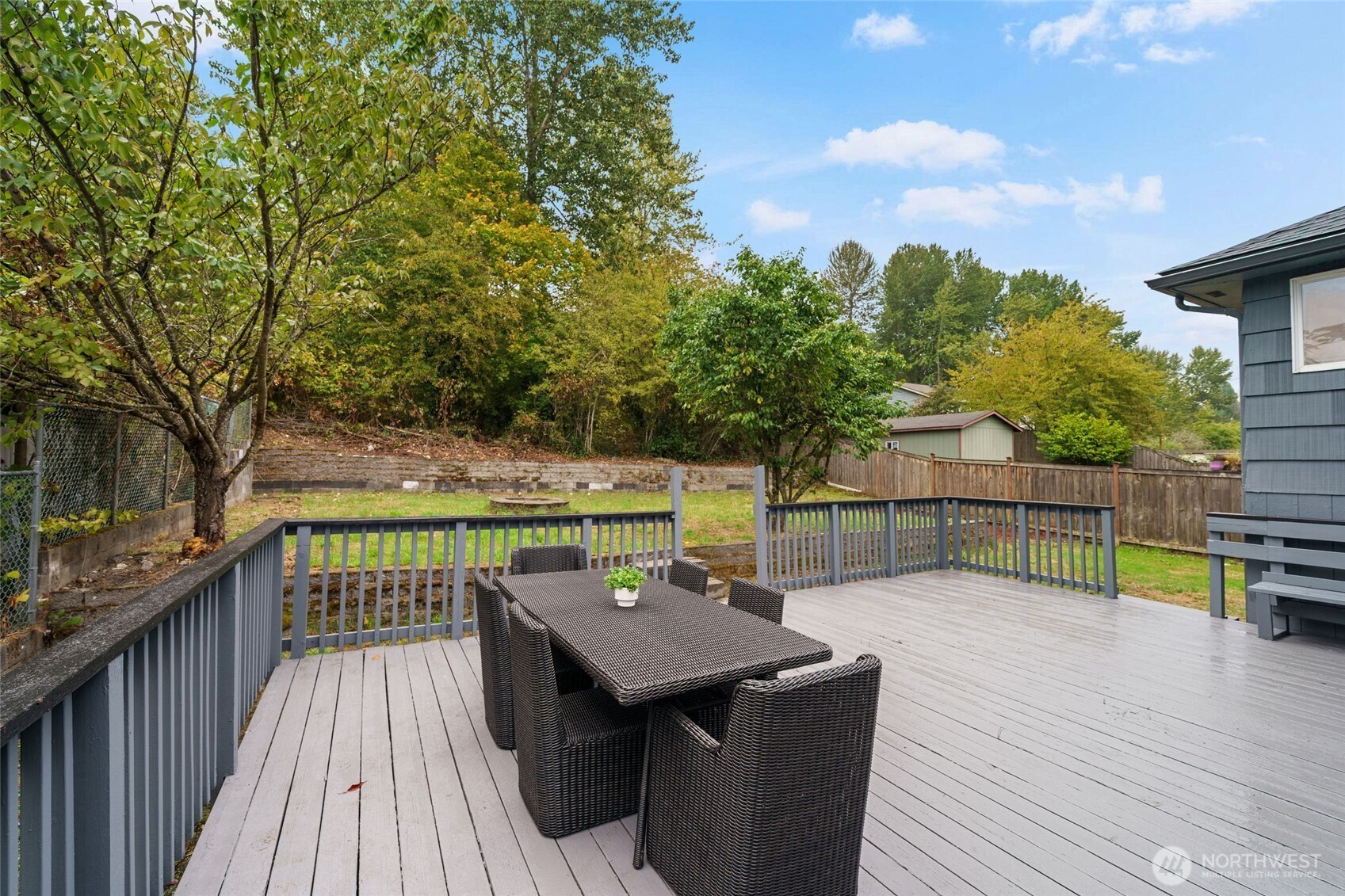 7004 16th Avenue Southwest Seattle, WA 98106 - Photo 32 of 37 a view of a chairs and table on the wooden floor