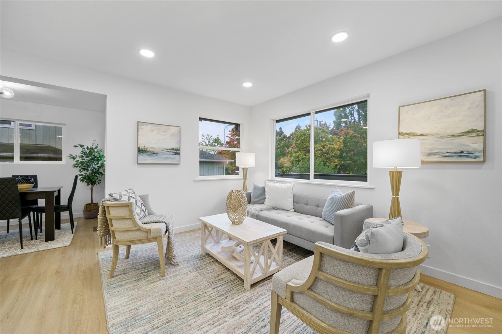 7004 16th Avenue Southwest Seattle, WA 98106 - Photo 9 of 37 a living room with furniture and a large window