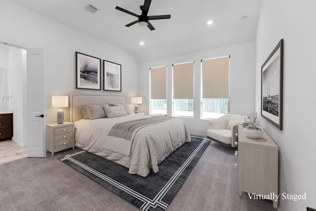 a bathroom with a double vanity sink mirror and shower