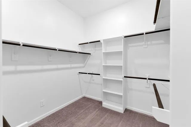 a view of a wooden door with a glass door