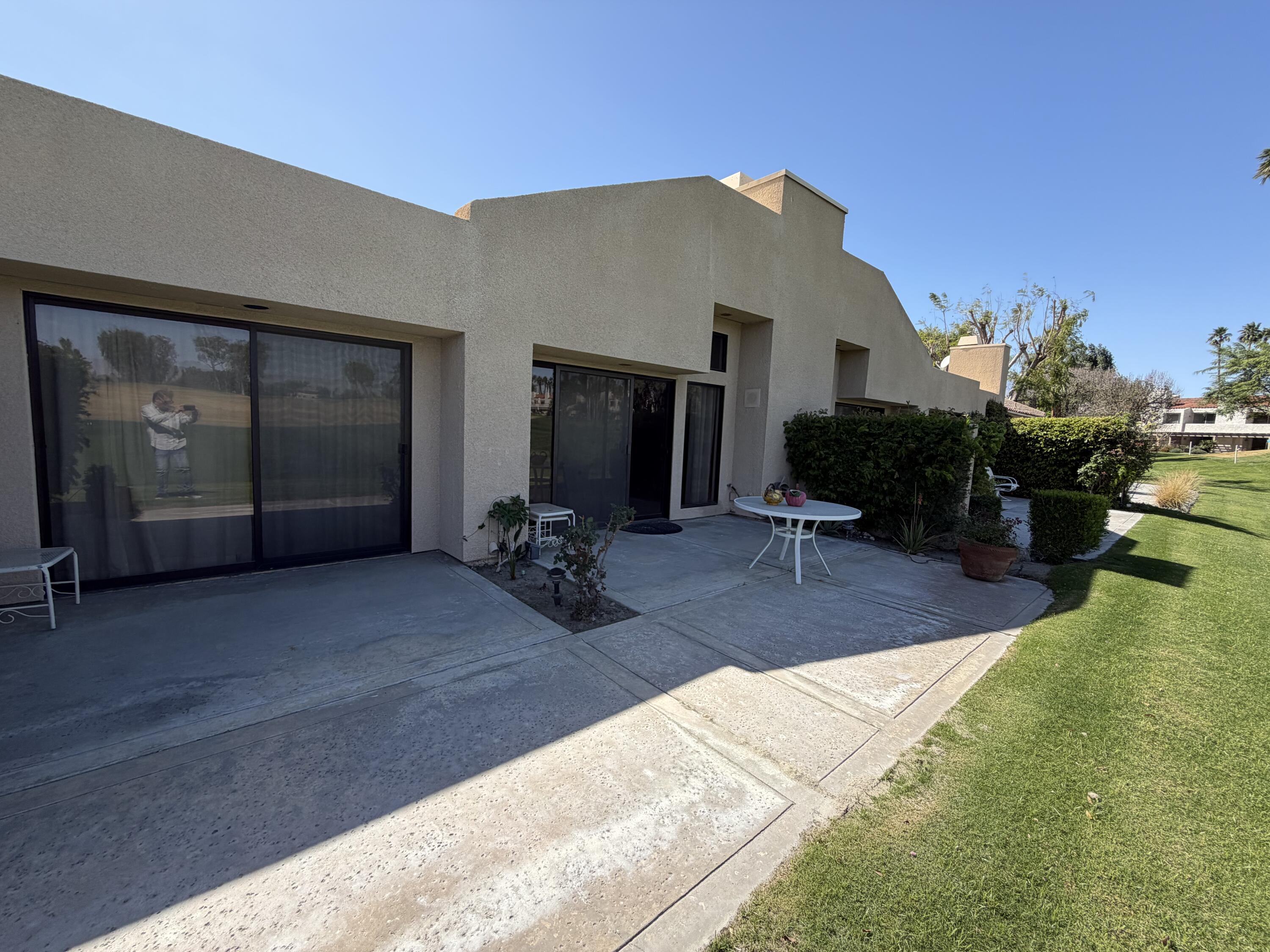 36 Mission Court Rancho Mirage, CA 92270 - Photo 9 of 17 a view of a house with patio outdoor seating