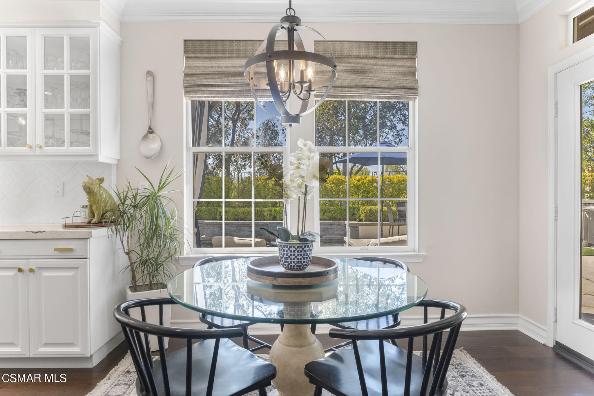 524 Oak Tree Court Simi Valley, CA 93065 - Photo 17 of 61 a dining room with furniture a chandelier and wooden floor