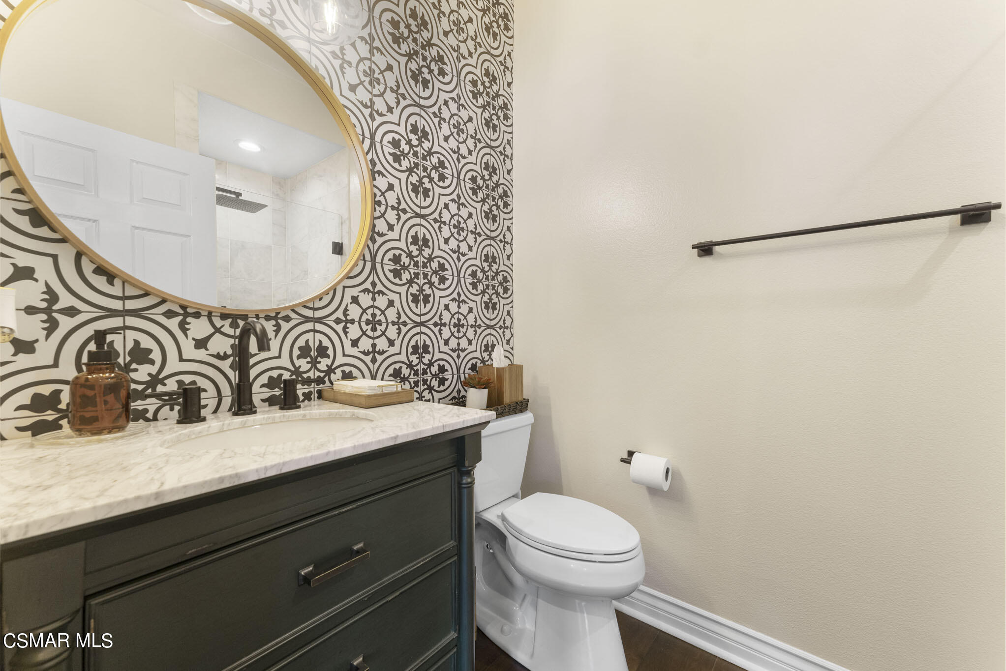 524 Oak Tree Court Simi Valley, CA 93065 - Photo 26 of 61 a bathroom with a sink and a mirror
