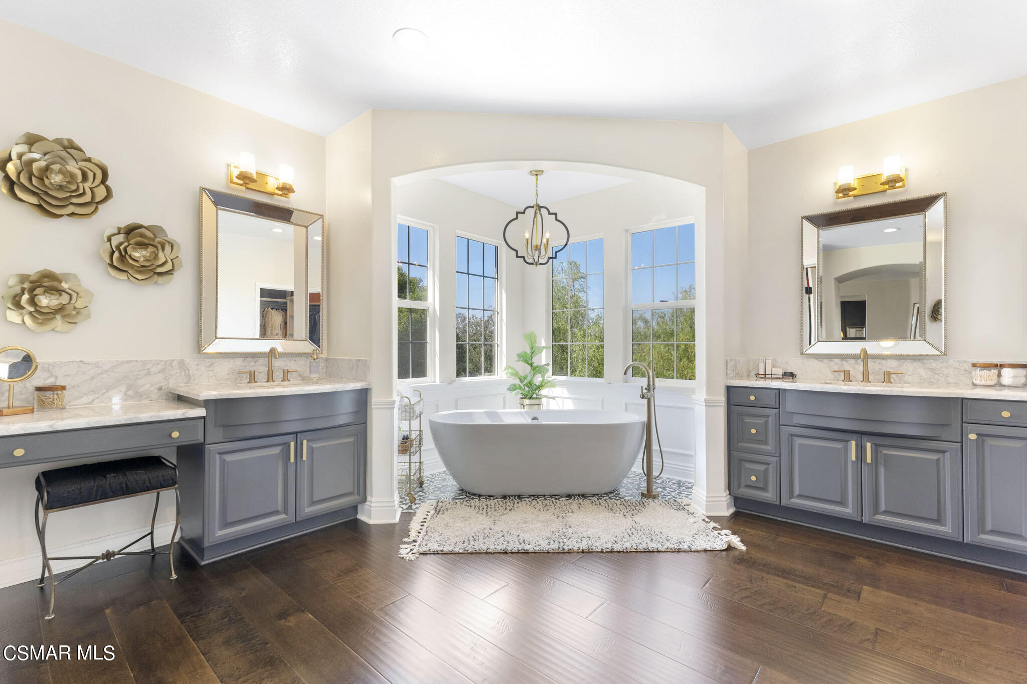 524 Oak Tree Court Simi Valley, CA 93065 - Photo 34 of 61 a room with kitchen island granite countertop a sink and a stove with wooden floor