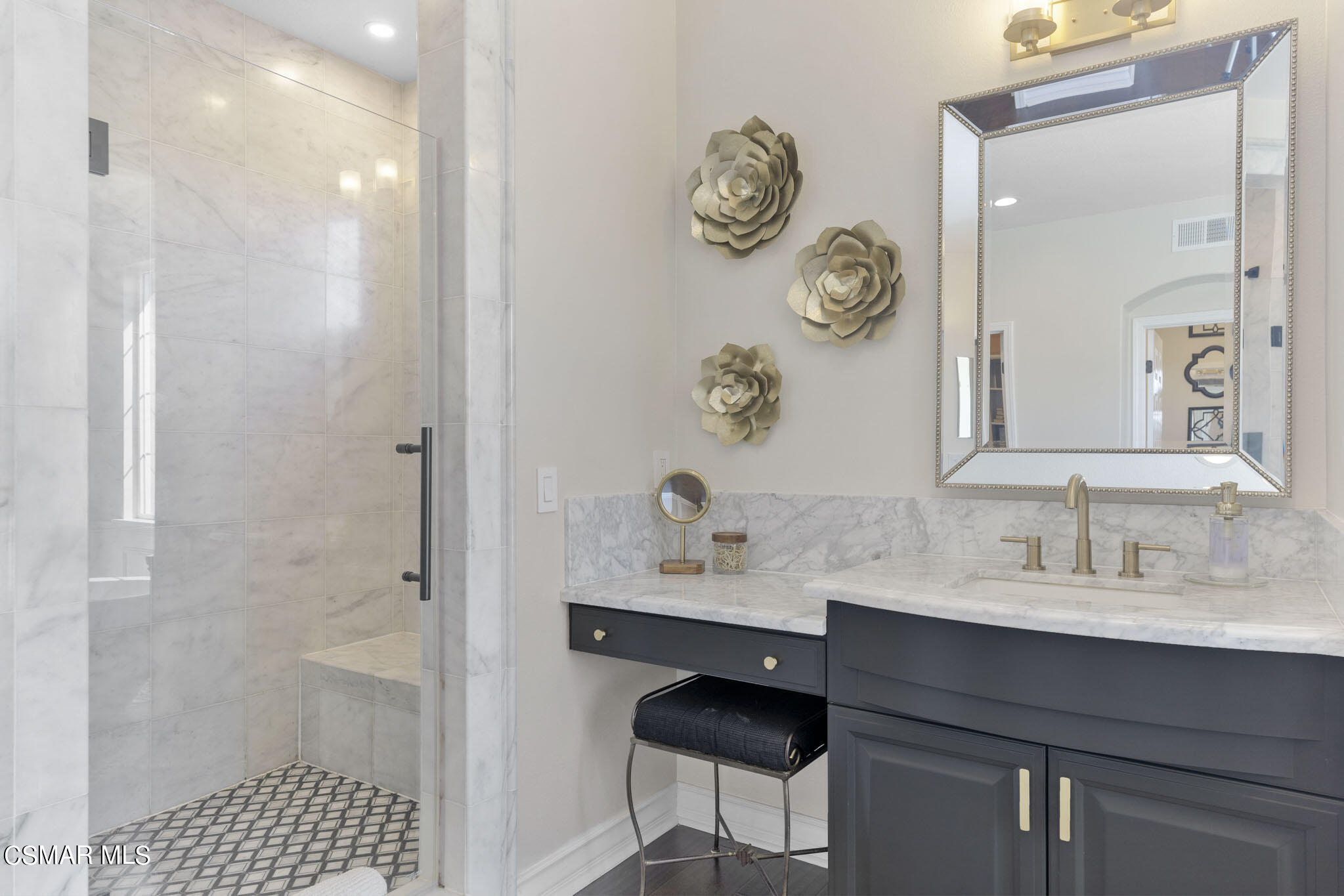 524 Oak Tree Court Simi Valley, CA 93065 - Photo 36 of 61 a bathroom with a sink a shower and a mirror