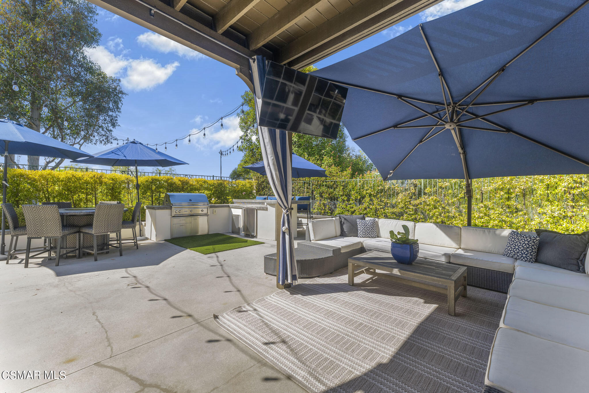 524 Oak Tree Court Simi Valley, CA 93065 - Photo 46 of 61 an outdoor space with furniture and umbrella