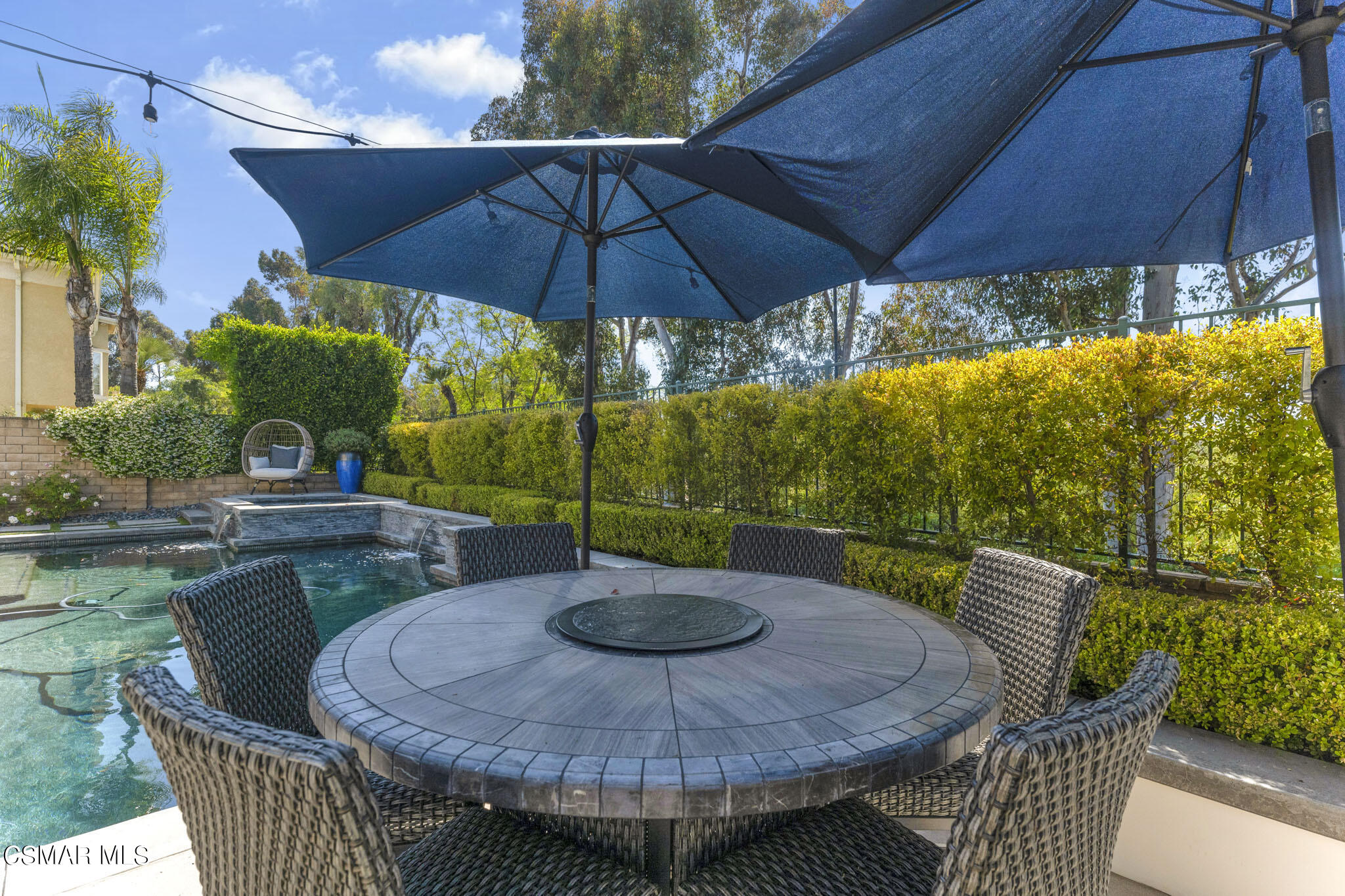 524 Oak Tree Court Simi Valley, CA 93065 - Photo 51 of 61 a view of an outdoor sitting area with furniture and umbrella