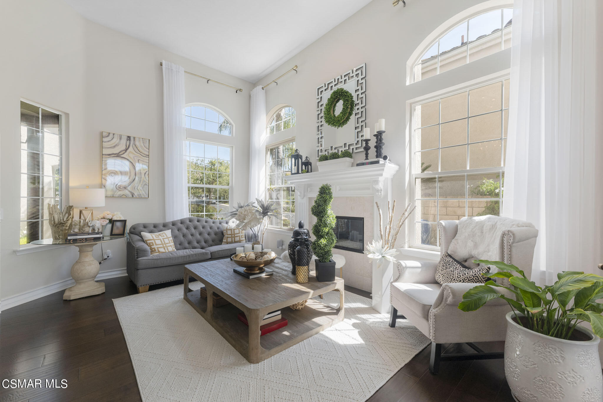 524 Oak Tree Court Simi Valley, CA 93065 - Photo 10 of 61 a living room with furniture potted plant and a window