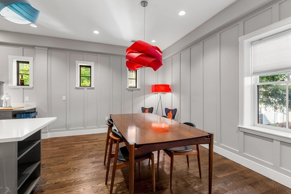 653 East 3rd Street Boston, MA 02127 - Photo 13 of 38 a view of a dining room with furniture and wooden floor