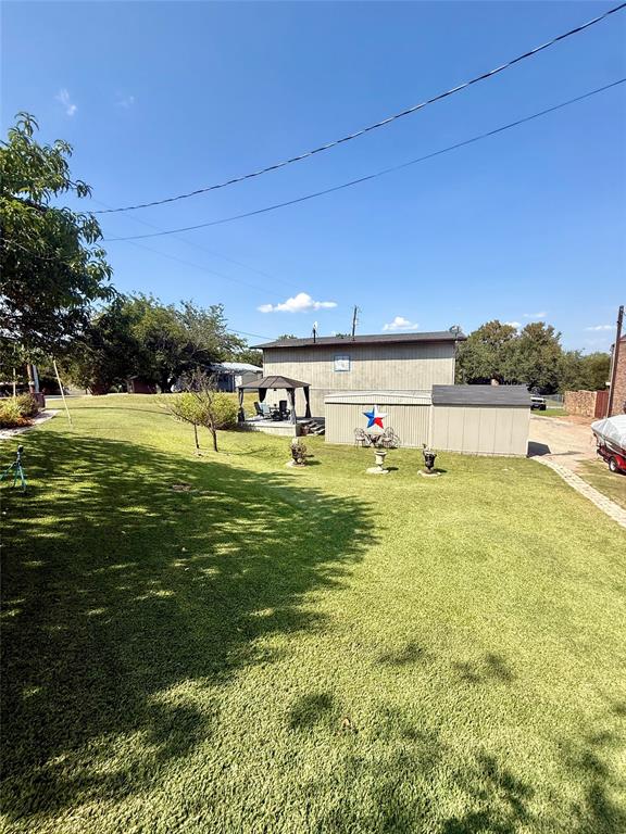 309 Broken Arrow Comanche, TX 76442 - Photo 26 of 33 View of green lawn
