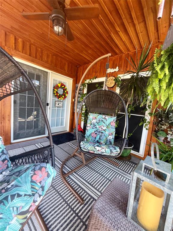 309 Broken Arrow Comanche, TX 76442 - Photo 3 of 33 Porch with a ceiling fan