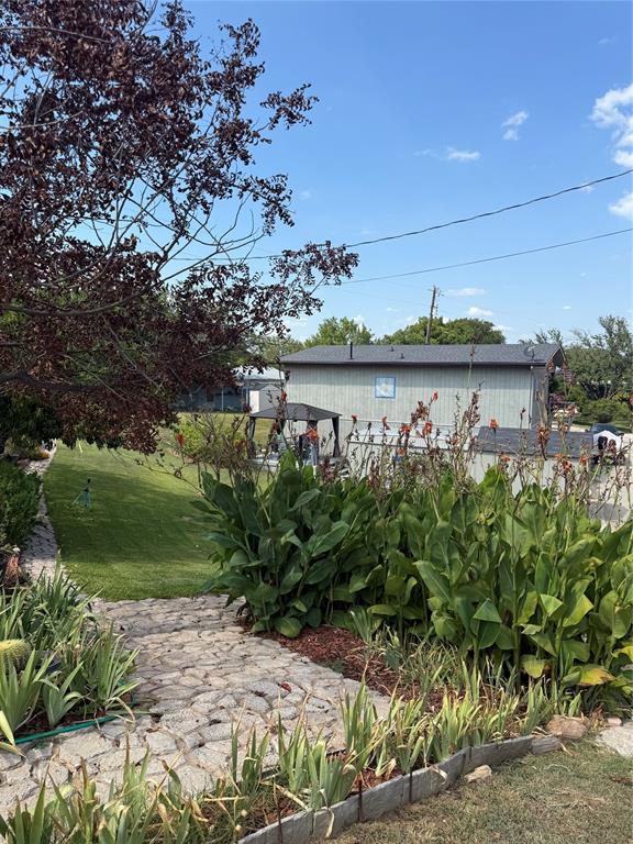 309 Broken Arrow Comanche, TX 76442 - Photo 32 of 33 View of grassy yard