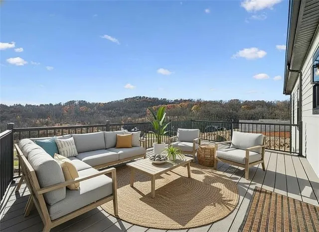 a view of a patio with couches chairs and a table
