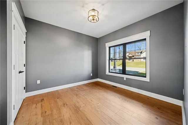 an empty room with windows